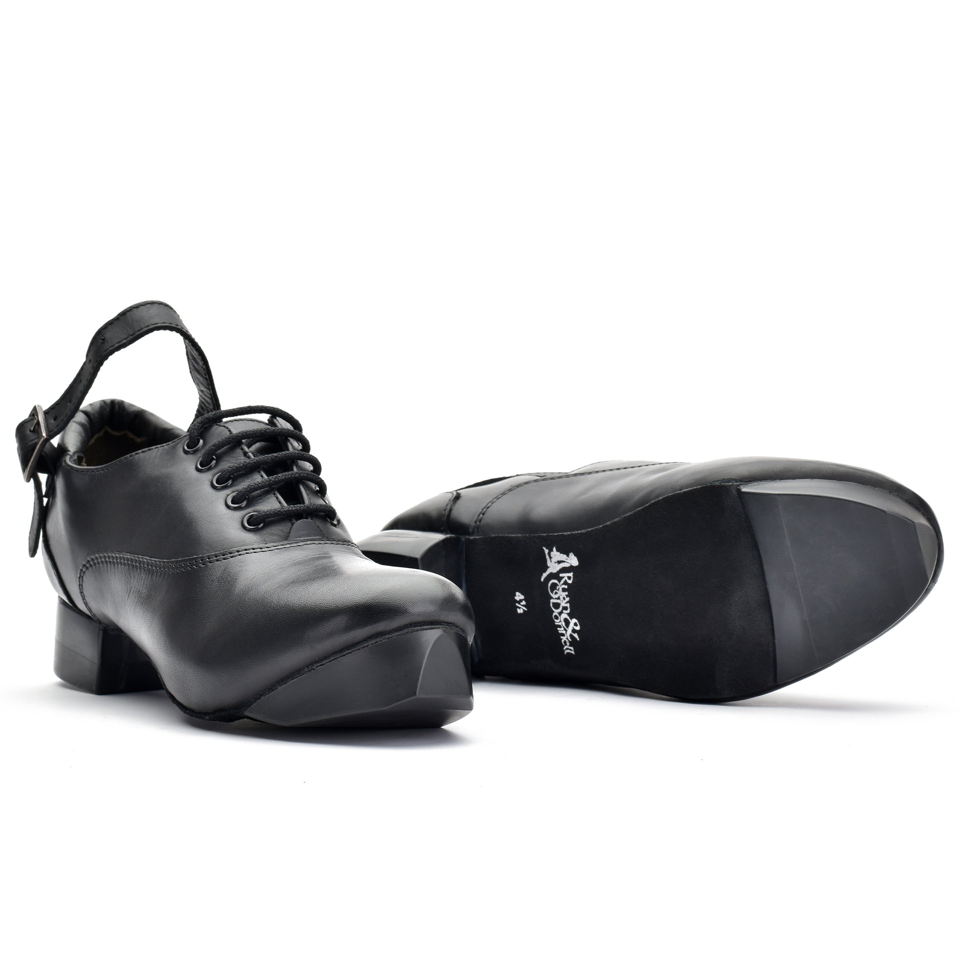 Black leather Irish dance hard shoe with 5-eyelet lace-up design, padded heel collar, and lightweight construction featuring advanced honeycomb-moulded heel and toe tips.